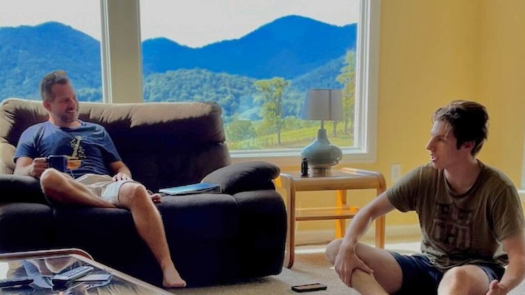 A teen boy talks to a therapist at Cabush, Paul, & Associates in Fairfax, VA