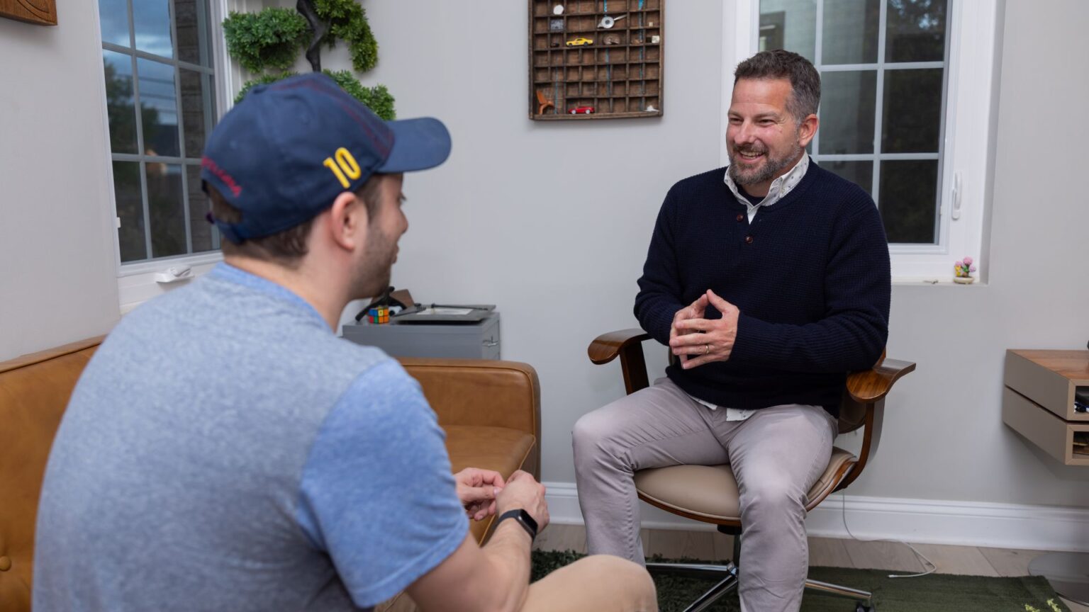 David Paul, partner in a Fairfax therapy practice speaks to an associate.