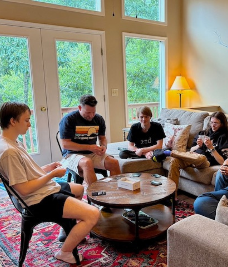 Teens and young adults in group therapy in Fairfax, VA, with firm partner, David Paul.